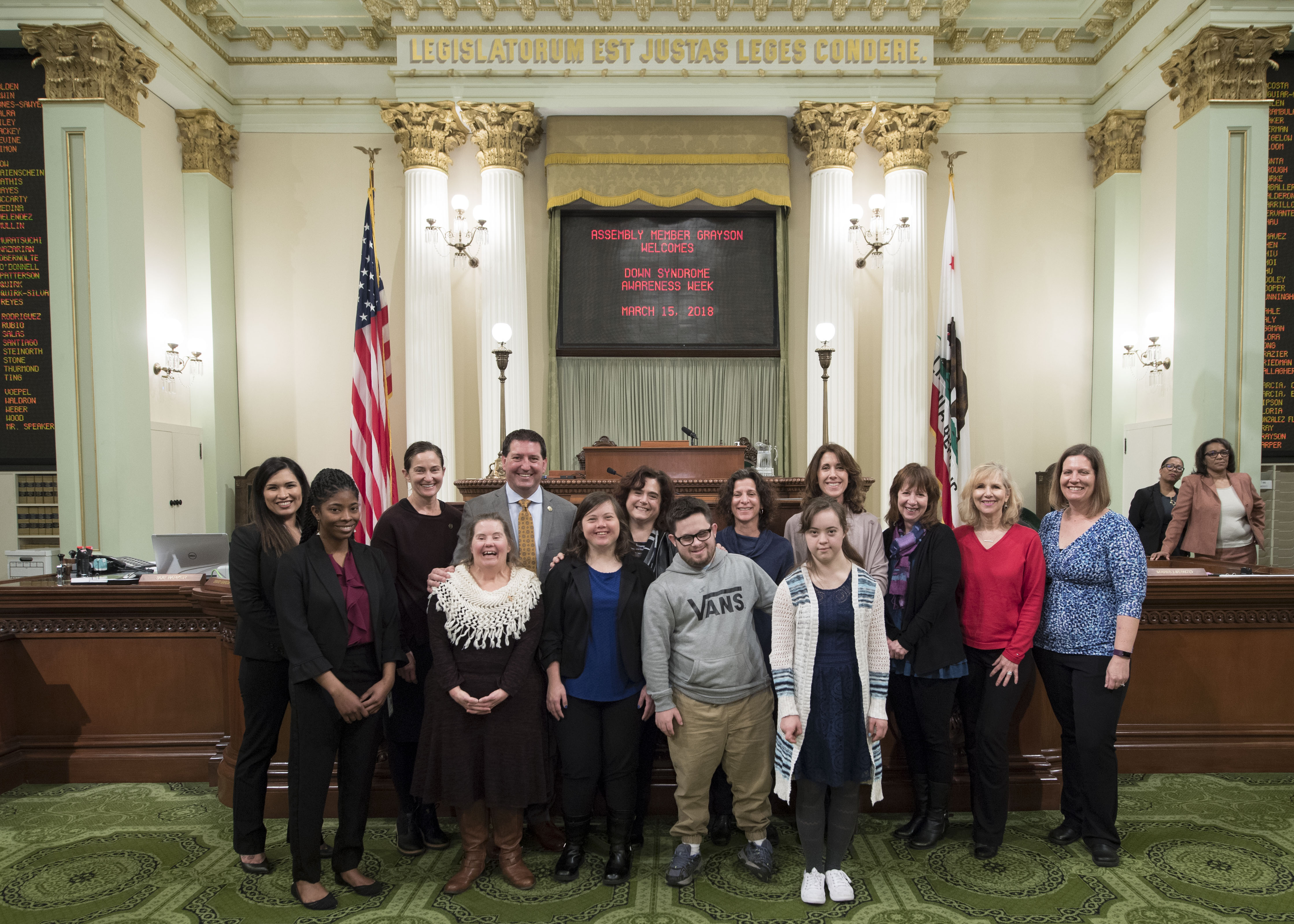 Assemblymember Tim Grayson (D-Concord) joins his sister Shari (white shawl) and members of the Down syndrome advocacy community on the Assembly Floor, following today’s presentation of ACR 165, proclaiming March 18 to March 24, 2018, as California Down Syndrome Awareness Week.