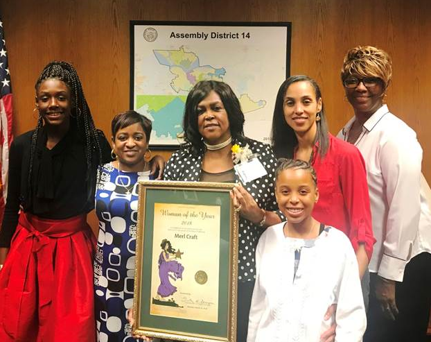 Pittsburg Councilwoman Merl Craft (holding certificate) poses with her family at the Woman of the Year ceremony at the State Capitol. Craft was named by Assemblymember Tim Grayson (D-Concord) as the Woman of the Year for his Assembly District